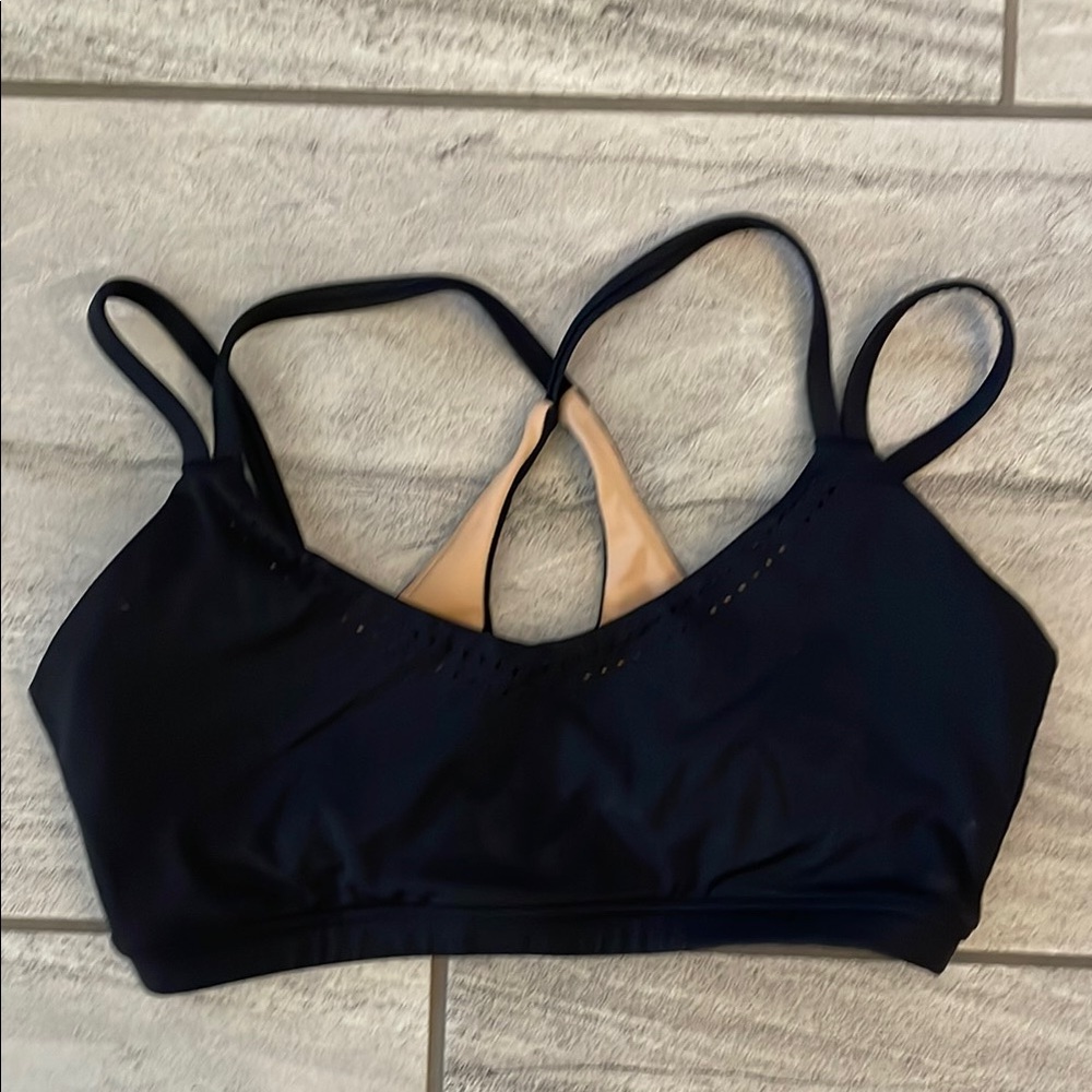 BuffBunny Black Sports Bra with Adjustable Straps and Minimalist Design